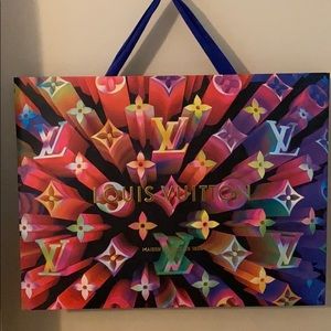 Louis Vuitton shopping bag.